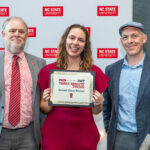 Griffin stands with Graduate School Dean Peter Harries and Rob Dunn, Senior Vice Provost for University Interdisciplinary Programs