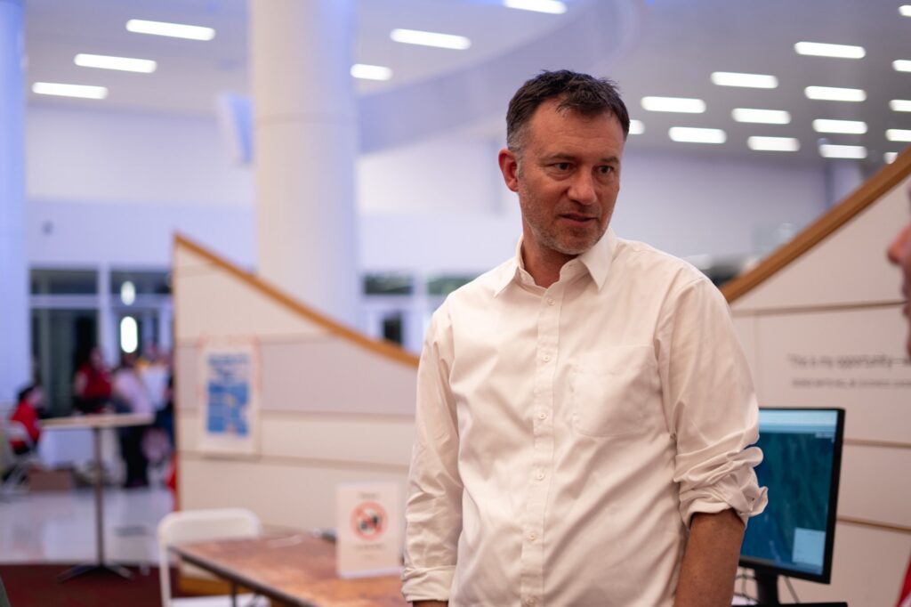 Karl Wegmann standing in Hunt Library
